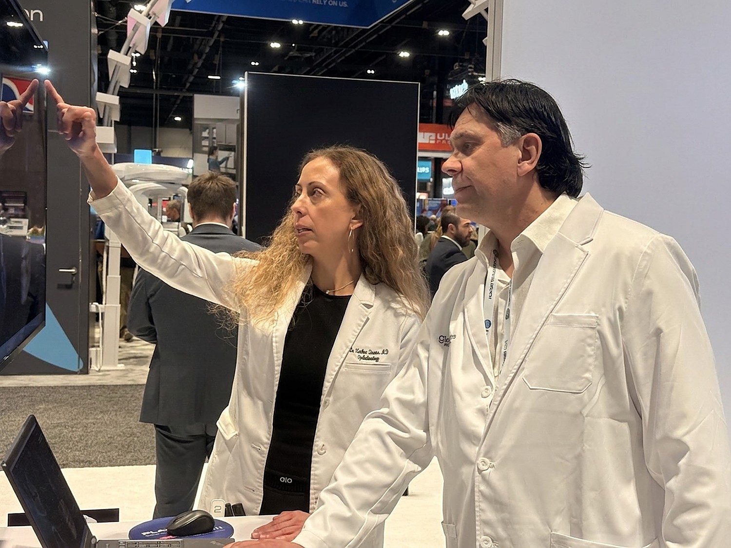 Both doctors reading a scan together at the imaging booth